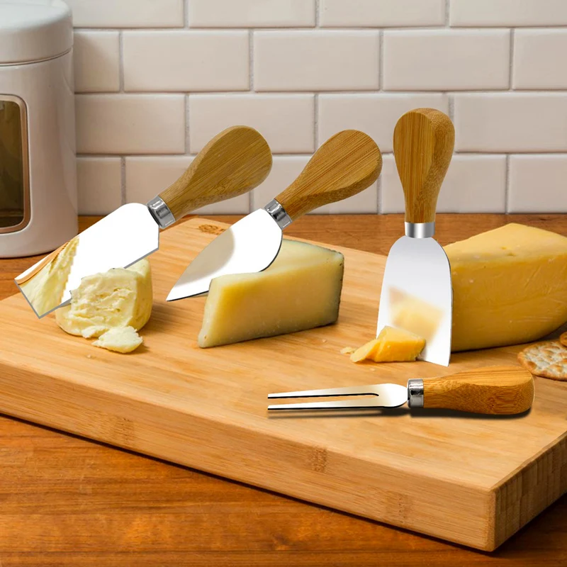 Sa0d3b51753c848e3926e655305c89944K.webp 4-Piece Stainless Steel Cheese Knife Set with Wooden Handles - Image 1